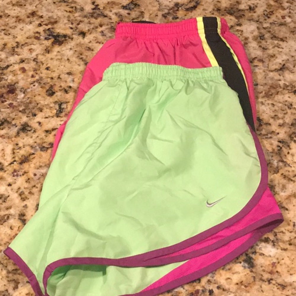 Two pair of Nike shorts.